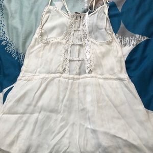 White romper with beautiful crochet back